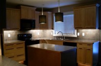 Kitchen under cabinet lighting and pendants